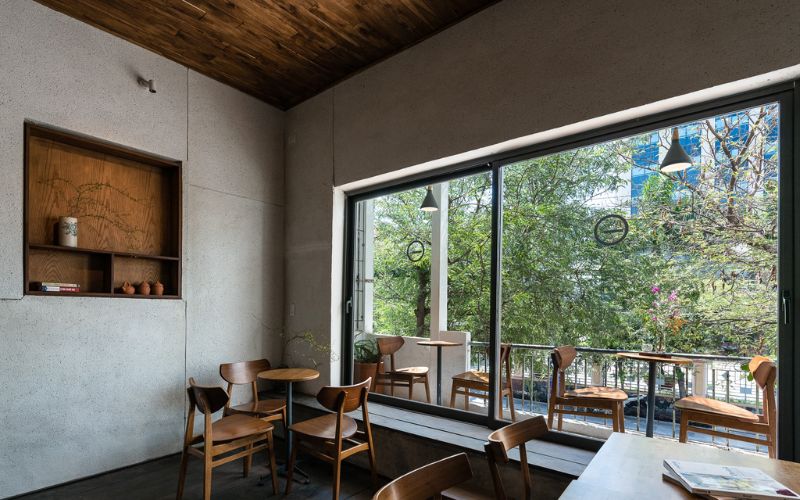 tầng trên thiết kế quán cà phê 2 tầng